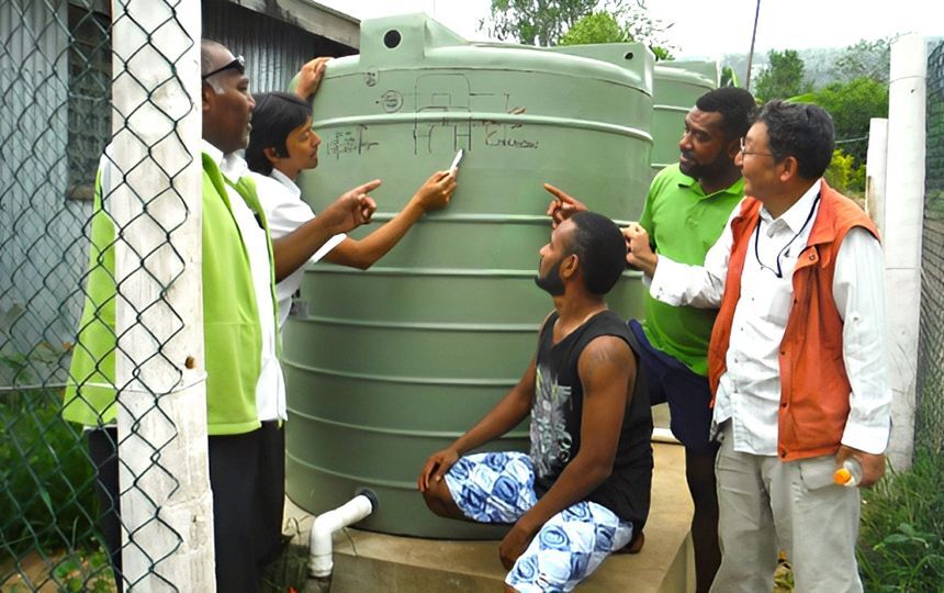 NAKAMOTO Tadanobu giving guidance of Ecological Purification System to local officials in Fiji.