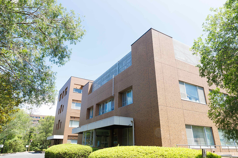 A building with a brown outer wall.